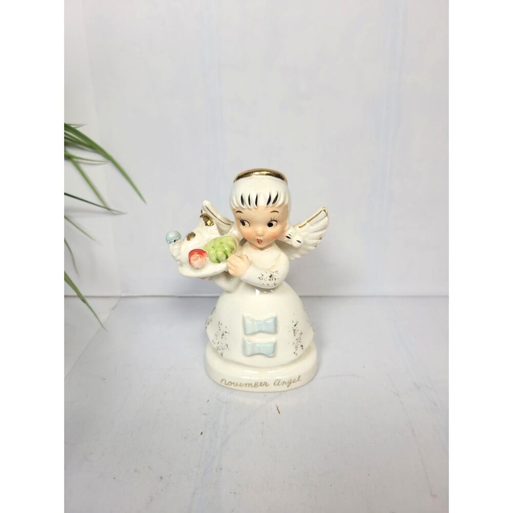 Vintage November Birthday Angel Figurine holding Thanksgiving Turkey Platter